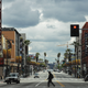 LOS ANGELES, CALIFORNIA - MARCH 25: A man crosses the unusually quiet Hollywood Boulevard near the shuttered Pantages Theatre as the coronavirus pandemic continues on March 25, 2020 in Los Angeles, California.